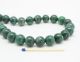 Jade - Kugel ~12 mm Ø - 1 mm Bohrung - grün gemasert poliert